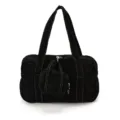 Black canvas tote bag detail view, contrasting white stitching, mini pouch pendant. - Black