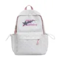 Close-up detail of the Japanese style polka dot student backpack front pocket and star print. - Without Pendant / Pink