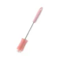 Pink silicone bottle brush with stainless steel handle for cleaning cups and glassware. - Pink