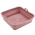 Pink foldable silicone air fryer liner, square baking tray with handles for kitchen cooking. - Pink