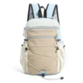 Detailed view of the color-blocked lightweight backpack with front drawstrings and pockets. - L / Blue Beige Khaki Color Block