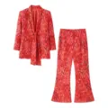 Stylish women's printed two-piece suit featuring a tie-front blazer and flared trousers. - S / Top And Bottom / Red and Yellow Gradient