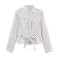 Chemise blanche et noire à pois à manches longues avec ceinture pour femmes, style chic. - S / Hauts