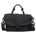 Detailed close-up view of a stylish black women's crossbody bag with a braided handle. - Black