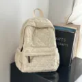 Beige quilted backpack for women, casual school bag and lightweight commuting daypack. - Off White