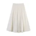 Detail view of the elegant white polka dot midi skirt, featuring a classic A-line design. - S / Bottoms / White