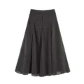 Classic black and white polka dot midi skirt detail view, elegant A-line flowy design. - S / Bottoms / Black
