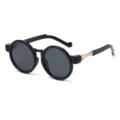 Klassische runde Sonnenbrille in Schwarz mit goldenen Metalldetails für Damen und Herren. - Schwarzer Rahmen Goldbein Graue Linse C1