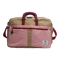 Front view detail of a large capacity color-blocked outdoor travel duffel bag. - Pink