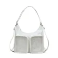 Detailed view of white hobo bag with star pattern and clear front pockets - White