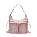 Close-up view of a pink Harajuku style ita bag featuring two large transparent front pockets - Pink