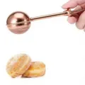 Infusor de te de acero inoxidable con mango de presion para te en hojas sueltas cocina - Medio perforado / Rosa oro