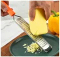 Stainless steel cheese grater with orange handle, perfect for lemon zesting and chocolate. - Style 2 / OPP Bag Packaging