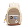 Frontalansicht eines farblich abgesetzten Rucksacks mit MARS SOCIETY Stickerei und Abzeichen - Mit Anhänger / L / Gebrochenes Weiß