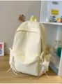 Mochila escolar amarillo crema con estrellas y llavero de peluche en una habitación acogedora - Con Colgante / Amarillo
