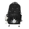 Detailed view of black Japanese style Ita bag with cute plush bunny charm and bow patterns - Black