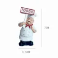 Cute resin chef fridge magnet with FOODIE sign, compact 7cm size for kitchen decor and notes. - Foodie / 7cm