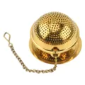 Boule a the en acier inoxydable dore avec chainette de suspension pour les feuilles de the - Avec Plateau / Or