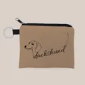 Detailopname van stoffen munttasje met dachshund-print en handige sleutelhanger. - Teckel Patroon (lqb3569)