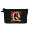 Borsa da trucco nera con stampa di lettera Q floreale vintage e farfalle colorate - Stile Q