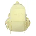 Détail du sac à dos jaune pour écolière avec broderie et porte-clés lune en peluche - Jaune