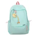 Gros plan d'un sac à dos en nylon vert menthe avec pendentif lune pour élèves - Sac à dos (Vert) / Vert
