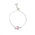 Silver-tone adjustable bracelet featuring a sparkling pink zircon heart pendant with dagger design. - Silver with Pink Heart