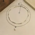 Double-layer natural freshwater pearl necklace set with bamboo-joint metal design. - Natural Pearl Bamboo Necklace Set