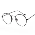 Montura de gafas redonda de metal negro retro con lentes anti-luz azul para unisex - Negro