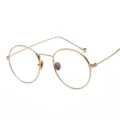 Montura de gafas redonda clásica de metal dorado con lentes anti luz azul claras - Dorado
