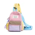 Detailed view of colorful nylon chest bag with star keychain accessory - With Charm / S / Pink