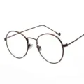 Montura de gafas redonda vintage de metal marrón con diseño minimalista moderno - Marrón