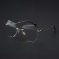Chic women's rimless heptagonal sunglasses featuring stylish gold-tone metal temples - Gold Frame Transparent