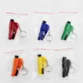 Mini car safety hammer keychain variant in multi-color, essential emergency escape tool. - OPP Bag / Green