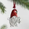 Detailed Christmas tree ornament featuring a cute metal gnome holding a lantern. - Santa Claus