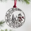 Close-up detail of a silver-tone metal Christmas tree ornament with intricate winter theme. - Snowman