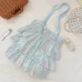 Primer plano bolso de organza azul claro con volantes y bordado de mariposa rosa - Bolso de Mano Bordado Mariposa en Capas (65311) / Azul Leche