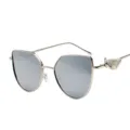 Retro silver sunglasses featuring unique wing relief temple design on white background - Silver Frame Silver Mirror Lens
