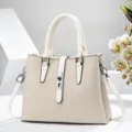 Élégant sac à main à motif chevron, design chic avec serrure grande capacité bandoulière. - Blanc Cassé