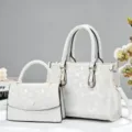 Detailed view of the white tote bag and matching purse set with chic pattern for daily commute. - Off White
