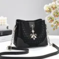 Black chic shoulder bucket bag with bow pendant, stylish daily crossbody bag for women. - Black