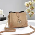 Stylish beige bucket bag with shoulder chain and bow charm for women trendy daily use - Khaki