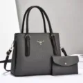 Stylish women gray PU leather tote bag with matching clutch cross body handbag set. - Gray