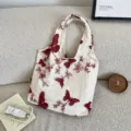 Detailed view of the vintage red butterfly embroidered canvas tote bag, casual daily use. - Red (44292) / Red