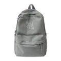 Grey grid backpack detail featuring front zipper pocket, white embroidery text, and top handle. - L / Light Gray
