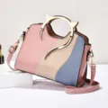 Women colorblock shoulder bag with metal cat ear handle and stylish contrast design for daily use. - Pink