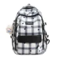 Sac à dos d'école à carreaux noir et blanc grande capacité avec pendentif en peluche - Noir