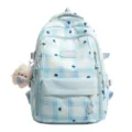 Joli sac à dos d'école à carreaux bleus pour filles avec motifs de cœurs, grande capacité et jolis charms. - Bleu