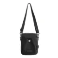 Black crossbody bag detail, featuring adjustable shoulder strap and front pocket with snap. - Solid Black