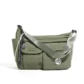 Olive green nylon crossbody bag featuring multiple front pockets, wide strap and cute charm. - Green